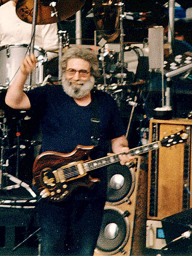 Jerry Garcia performing with the Grateful Dead at Red Rocks Amphitheater, 1987. 